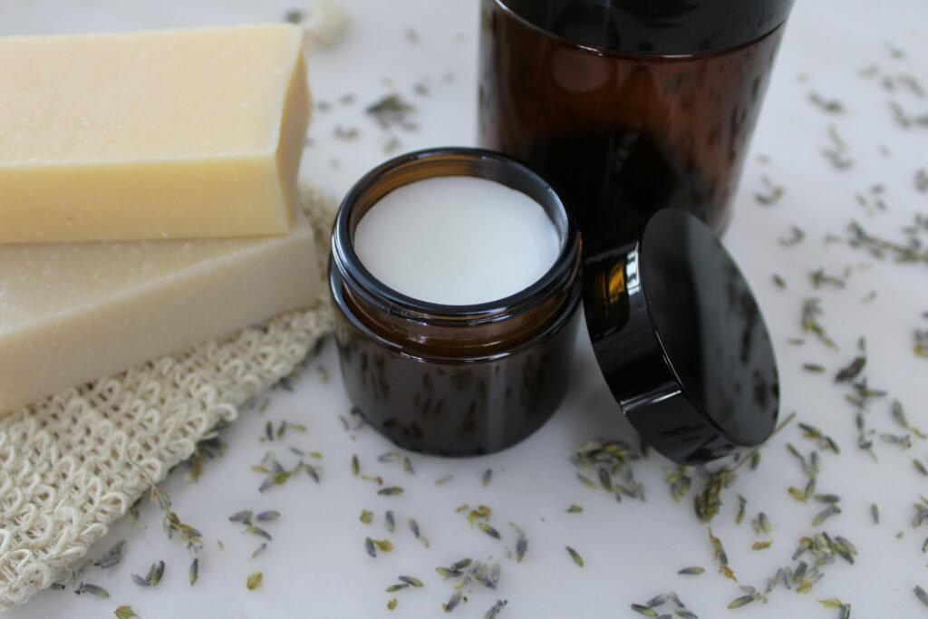 herbal salve in a brown jar sitting on a white table