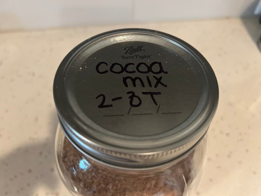 Labeled jar of hot cocoa mix