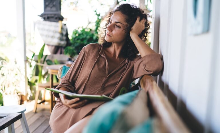 pondering female student planning content