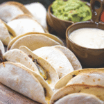 street tacos on a wooden cutting board